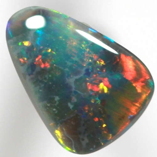 SOLID BLACK OPAL Bright and sparkling gold, cherry red over blue